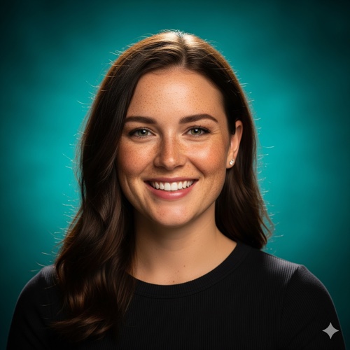 Studio portrait of a smiling woman with freckles, rim-lit, 85mm f/1.8, softbox catchlights, teal seamless backdrop, shallow depth of field, ultra-sharp eyes